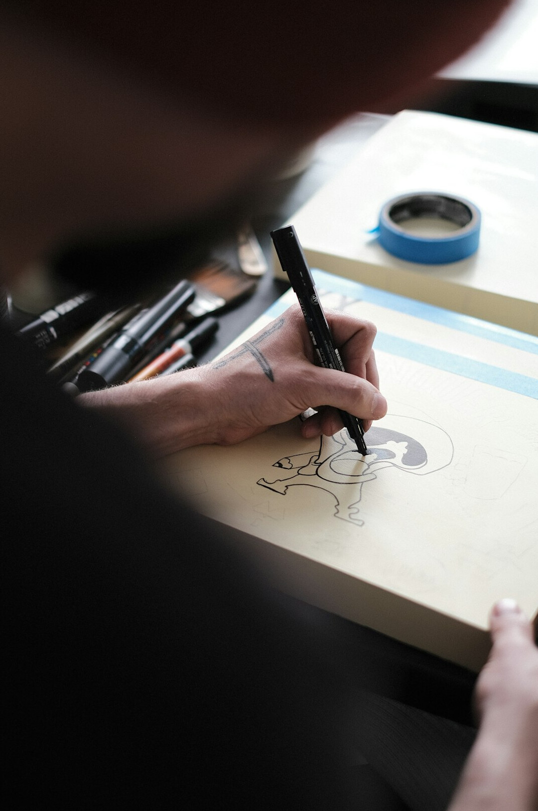Studio portrait of a Swiss creative director reviewing a storyboard